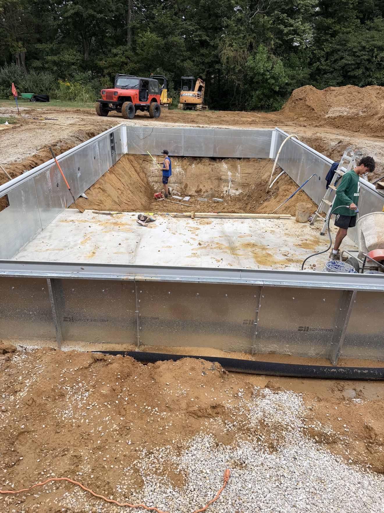 Hopper slopes being shaped at the deep end of the inground pool